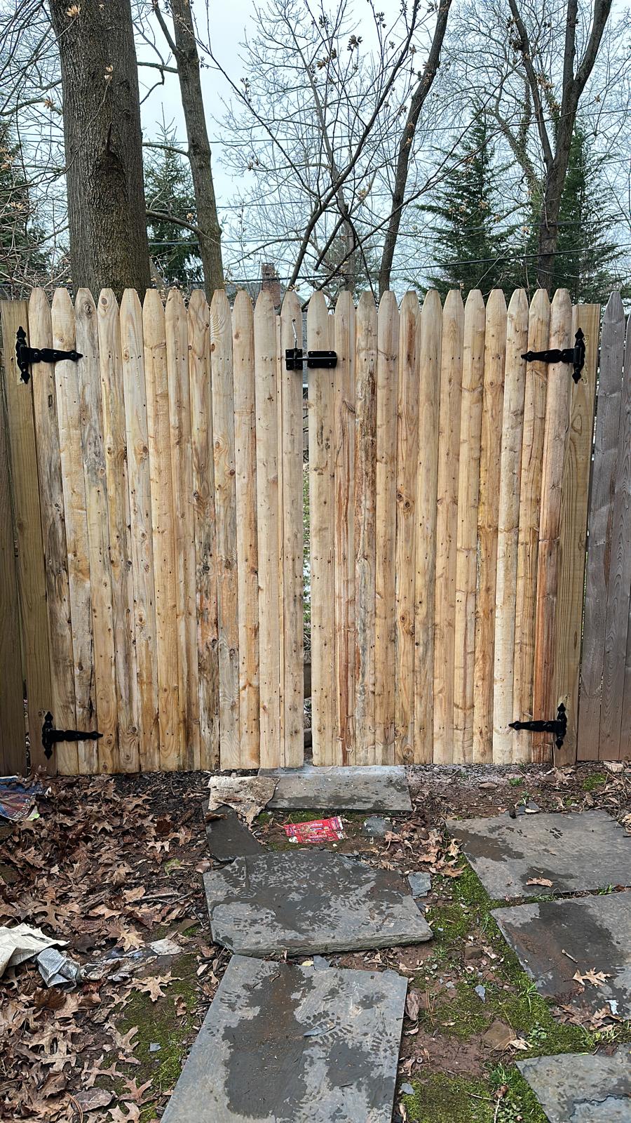 Completed fence installation by the Three Brothers Fence Co. crew