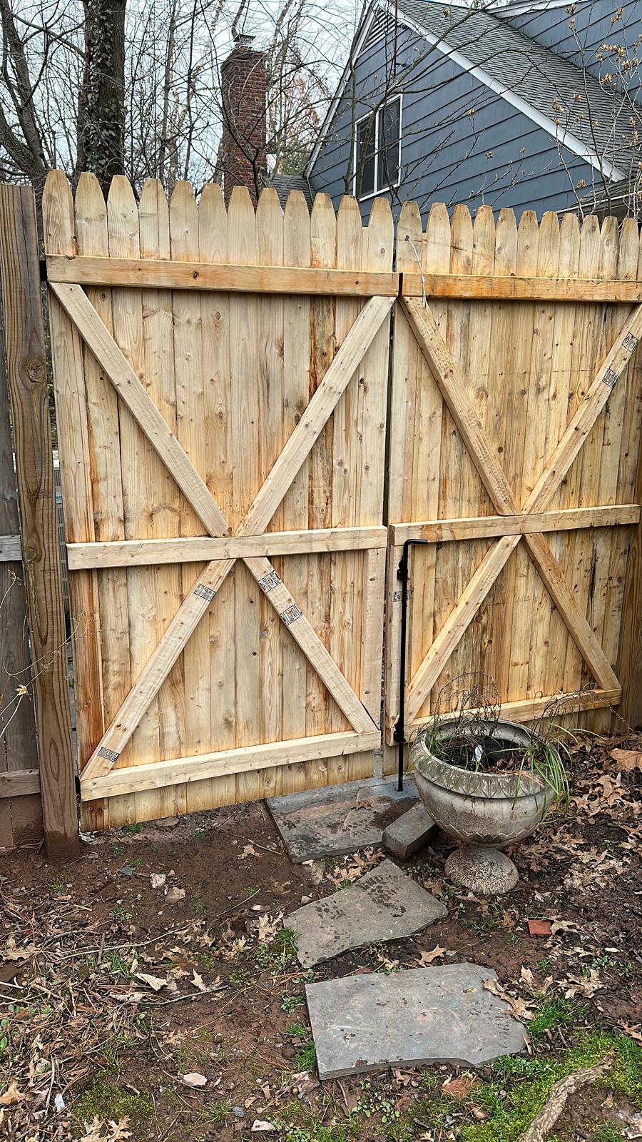 Completed fence installation by the Three Brothers Fence Co. crew