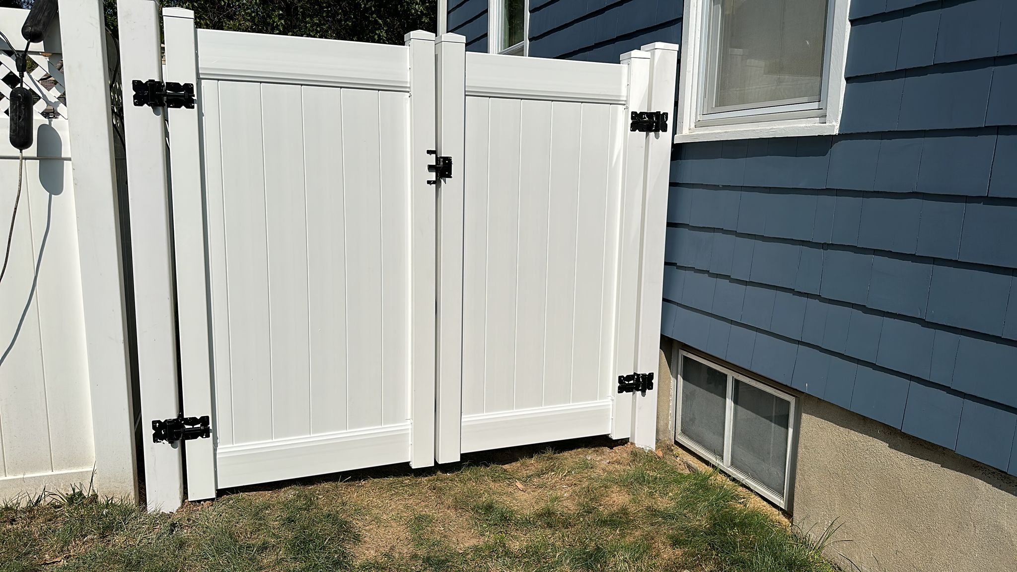 Completed fence installation by the Three Brothers Fence Co. crew