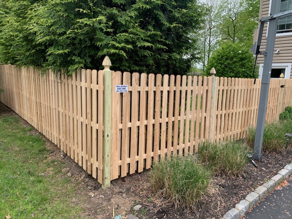 Completed fence installation by the Three Brothers Fence Co. crew