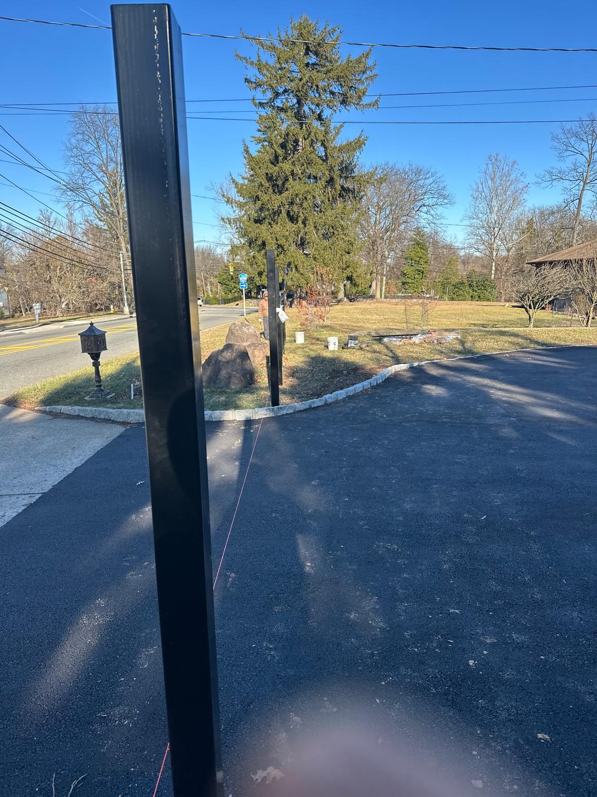 Completed fence installation by the Three Brothers Fence Co. crew