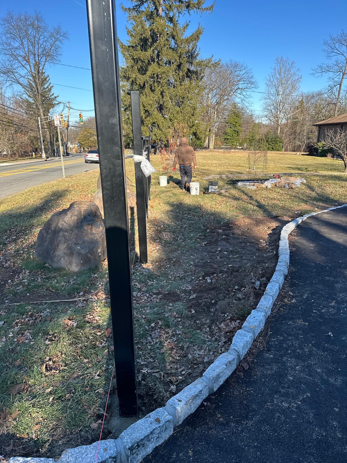 Completed fence installation by the Three Brothers Fence Co. crew