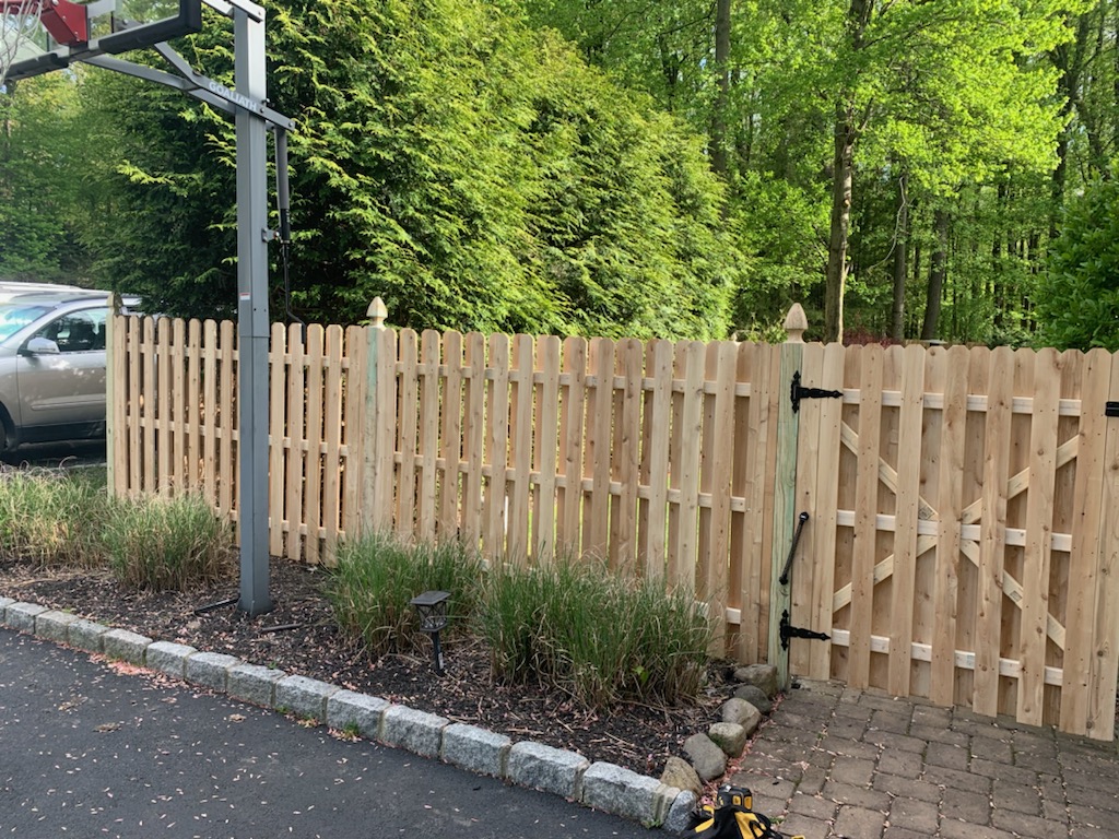 Completed fence installation by the Three Brothers Fence Co. crew
