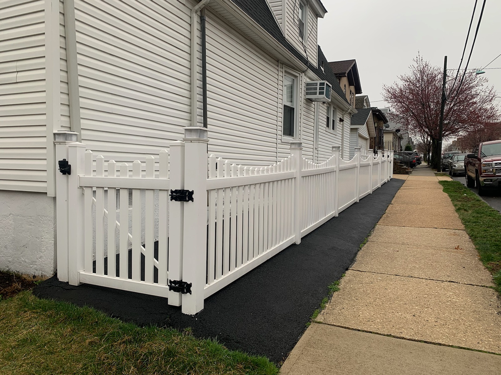Completed fence installation by the Three Brothers Fence Co. crew