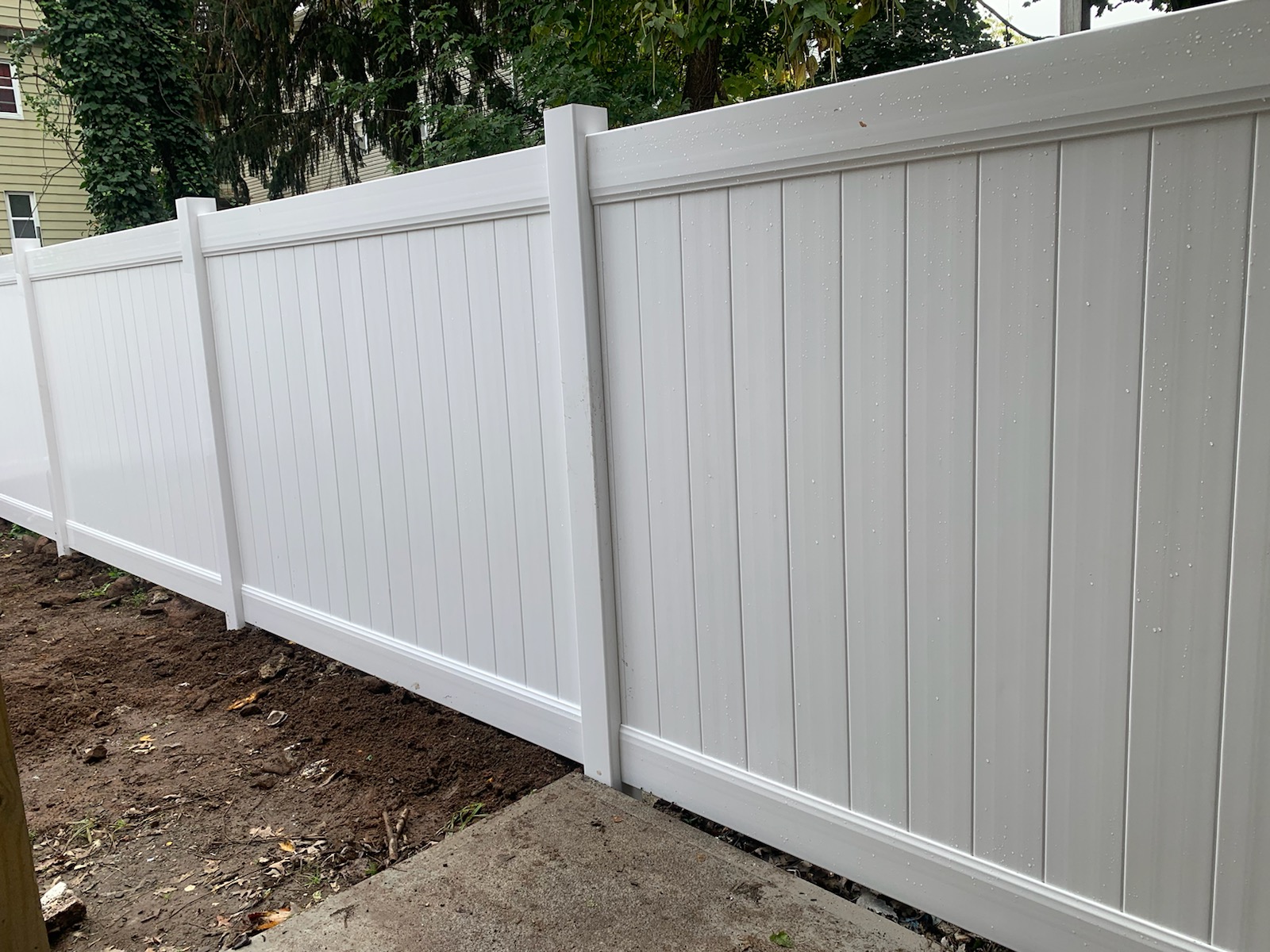 Completed fence installation by the Three Brothers Fence Co. crew