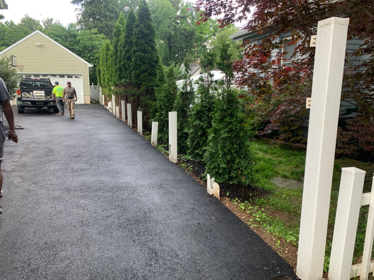 Completed fence installation by the Three Brothers Fence Co. crew