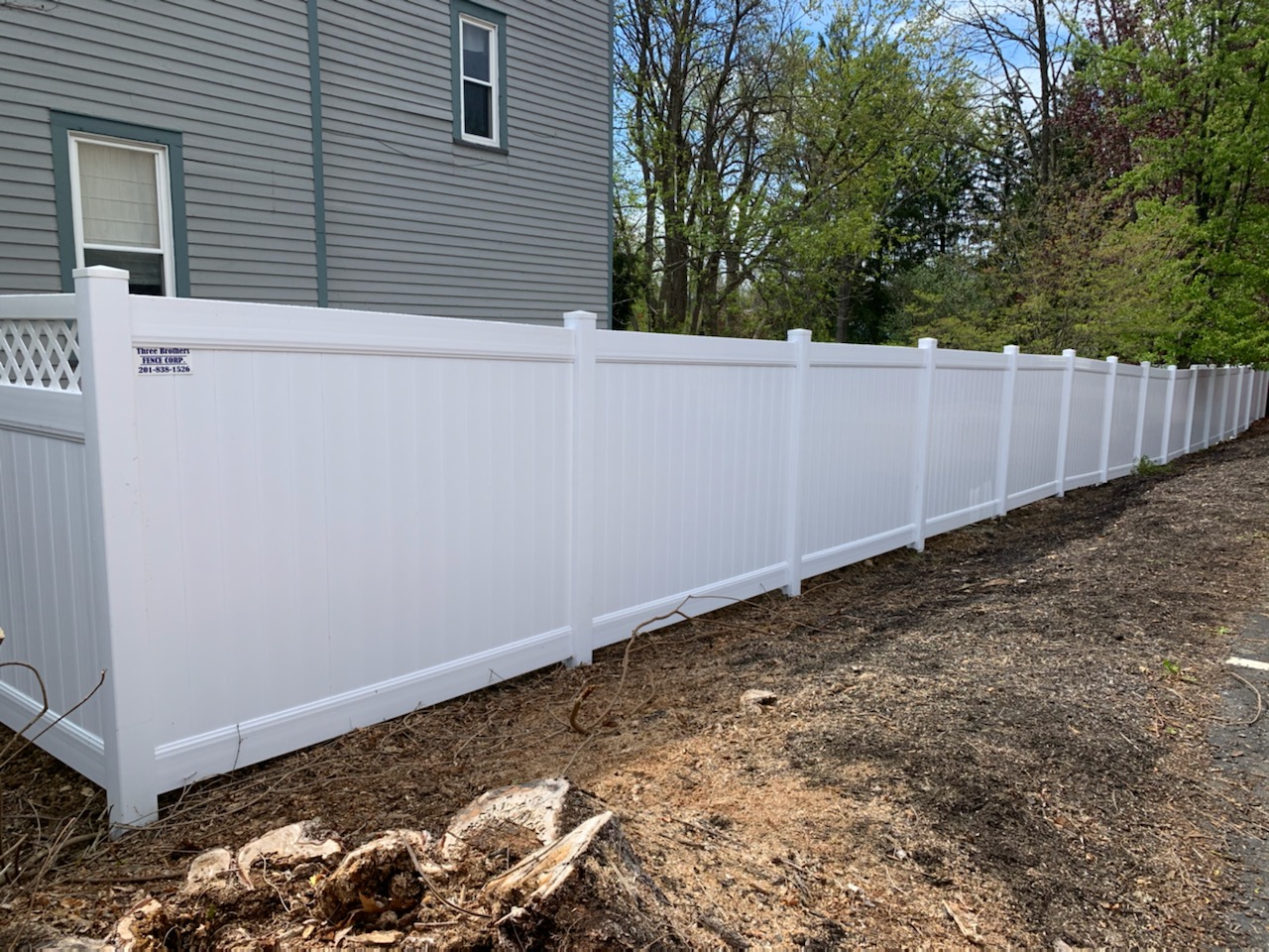 Completed fence installation by the Three Brothers Fence Co. crew